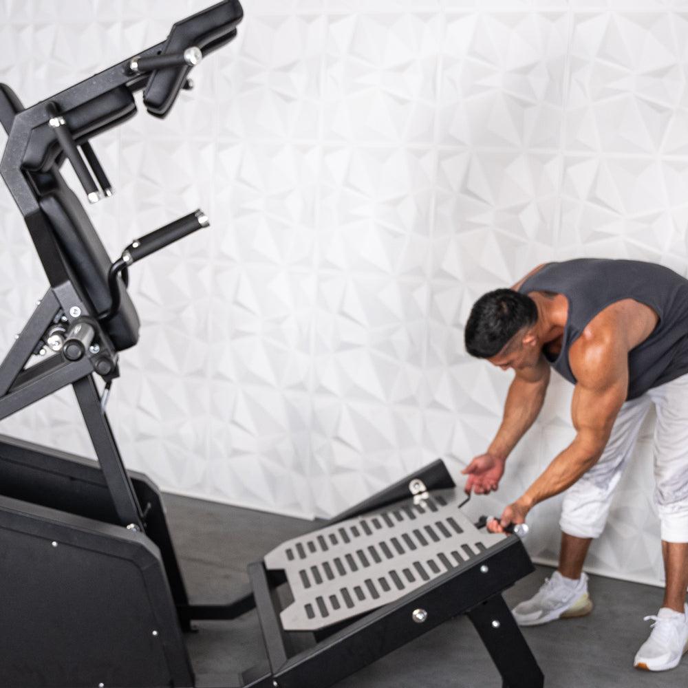 Muscle D Fitness - Excel Glute Line Hack Squat - Front Squat - Plate Load Squat Machine - Counter Balanced - Plate Storage Pegs