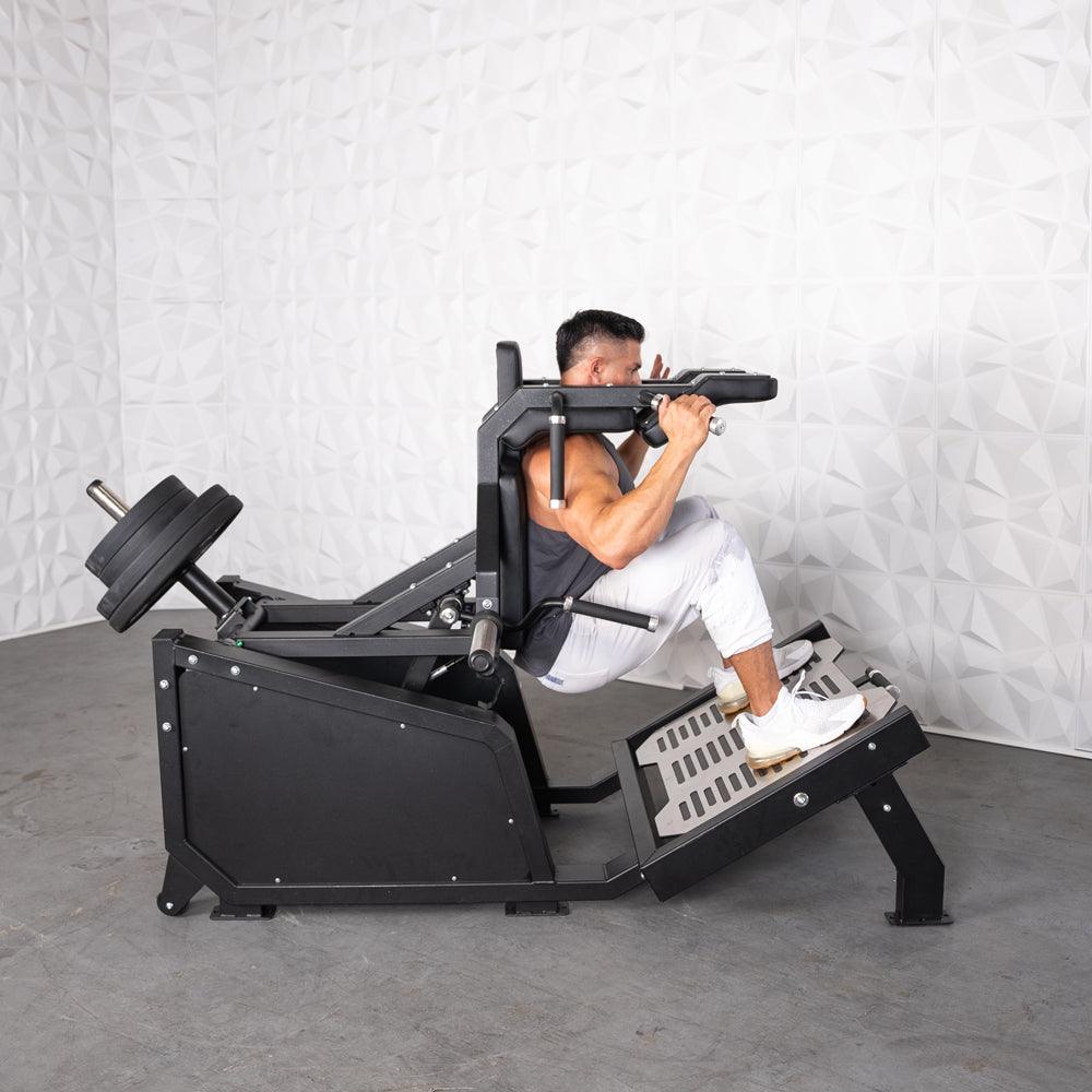 Muscle D Fitness - Excel Glute Line Hack Squat - Front Squat - Plate Load Squat Machine - Counter Balanced - Plate Storage Pegs