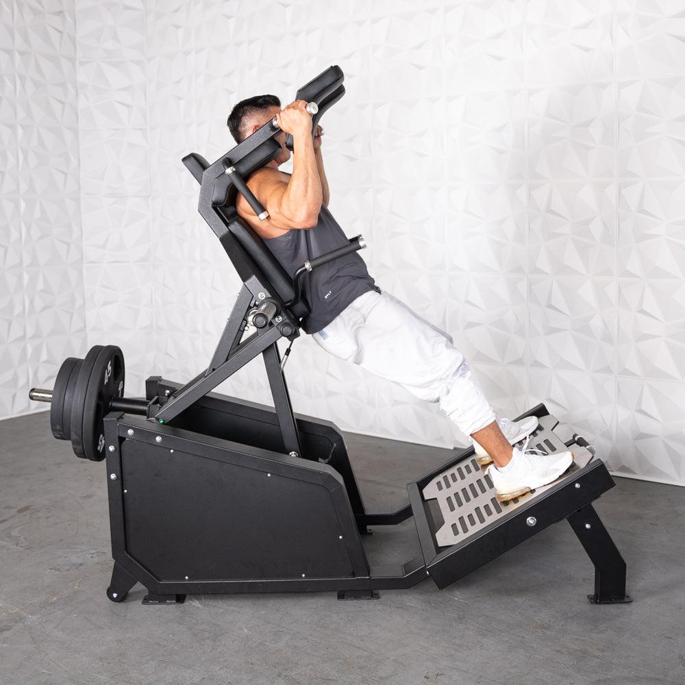 Muscle D Fitness - Excel Glute Line Hack Squat - Front Squat - Plate Load Squat Machine - Counter Balanced - Plate Storage Pegs